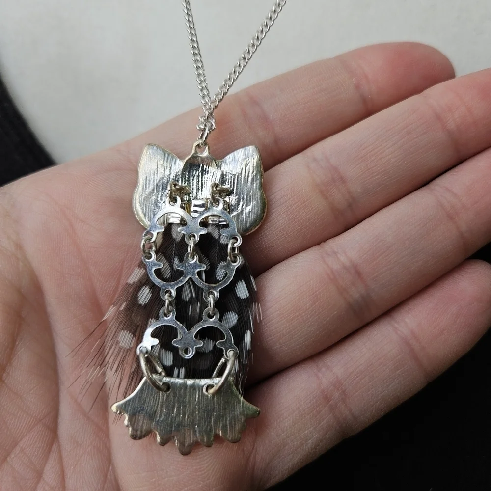 silver tone chain necklace with feathery owl pendant